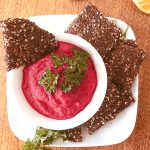 Beet and yellow pea hummus with homemade cracklins. ÉPITHÉLIA- Digestive health clinic.